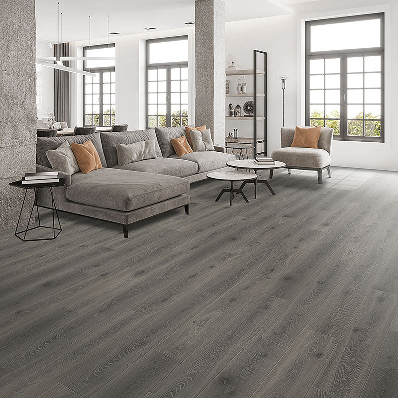 Medium grey toned oak laminate flooring in a casual modern space