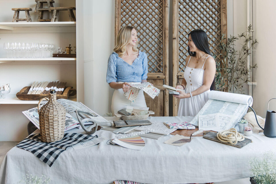 Interior Designers Stephanie and Mae from MartinLee Design of Calgary select materials for their Bakery Cafe in support of Kids Cancer Care