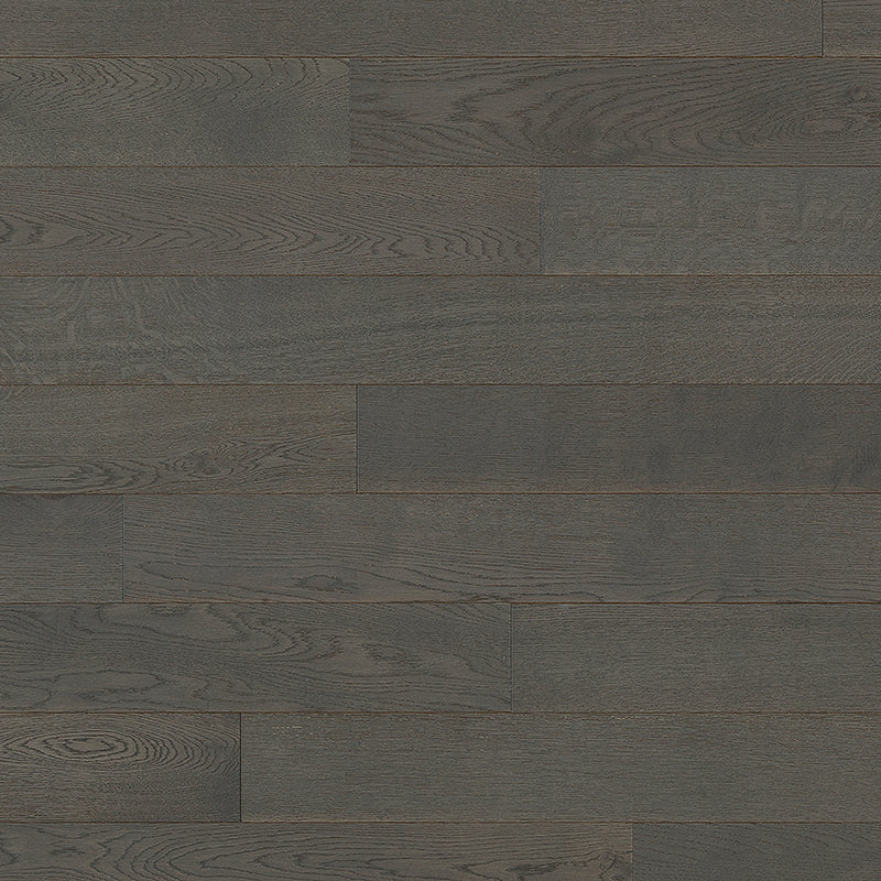 Dark-stained oak wood flooring with a matte finish and visible natural grain patterns, arranged in a staggered plank layout.