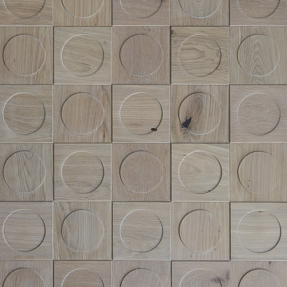 Wooden panel with circular recesses arranged in a grid pattern