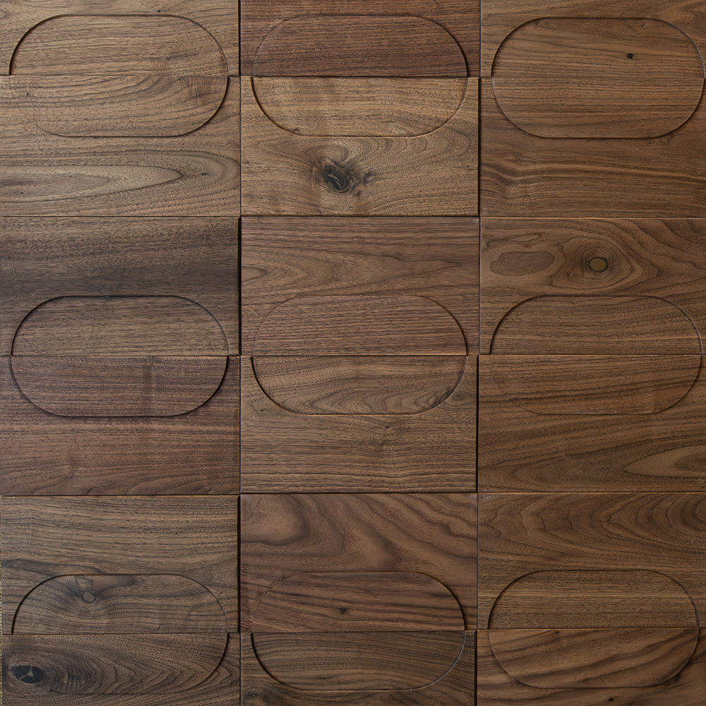 Wooden panel with a grid pattern of oval cutouts