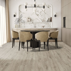 Light toned oak grain laminate flooring installed in a contemporary kitchen
