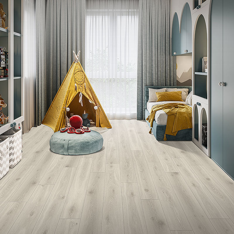 Light oak grain laminate floors installed in a young childs bedroom with play tent