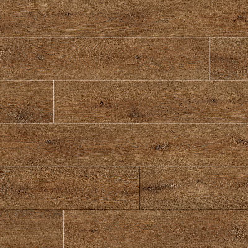 Warm toned oak grain laminate flooring planks