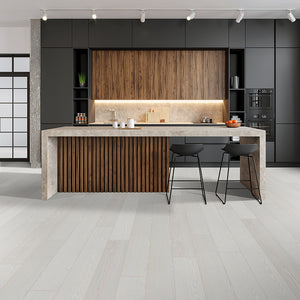 Light toned oak vinyl floor planks in a minimalist kitchen