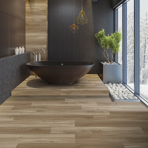 Brown Sugar Maple Dry Back Vinyl flooring from the Journey Collection by Divine installed in a modern bathroom with floor to ceiling windows