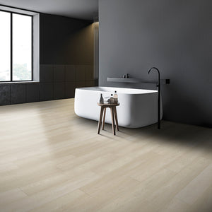 White Rabbit Loose Lay Vinyl Plank Flooring from the Journey Collection by Divine installed in a minimalist bathroom