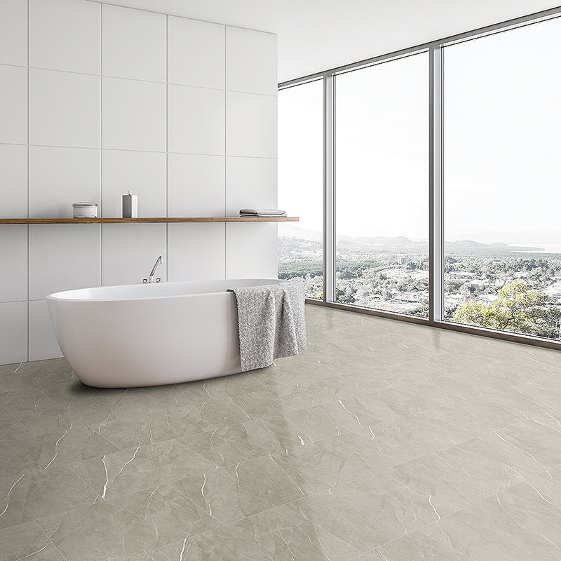 Sitting Pretty marble look in luxury vinyl tile flooring installed in a minimalist bathroom
