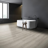Voyage II Cool Hand Luke Vinyl Plank Flooring in a minimalist bathroom